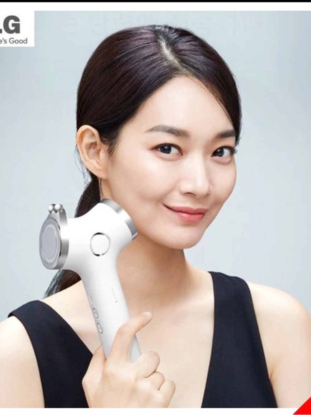 LG White Facial Sculpting Device with Silver Accents